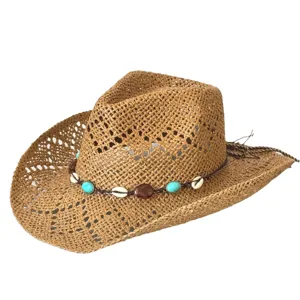 Bohemian hollow out straw cowboy hat with turquoise beads, perfect for summer beach vacation.