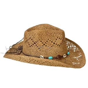 Bohemian hollow straw hat detail, wide brim sun protection cowboy hat for summer beach vacation.
