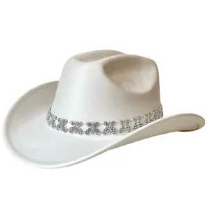 White cowgirl hat detail featuring rhinestone butterfly chain band for party and stage wear.
