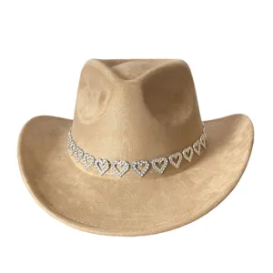 Close-up detail of rhinestone heart suede cowboy hat, retro wide brim jazz hat for party.