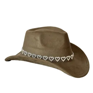 Close-up of the stylish brown suede cowboy hat featuring a sparkling rhinestone heart band.