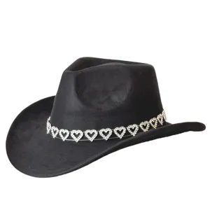 Detailed view of black suede cowboy hat with sparkling rhinestone heart chain for party wear.