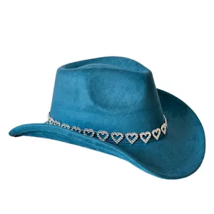 Detail view of blue faux suede cowboy hat with sparkling rhinestone heart chain trim