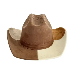 Detail view of brown beige color block suede western cowboy hat jazz fedora closeup