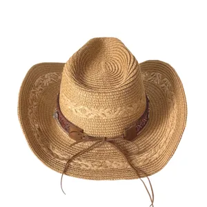 Chapeau de cowboy en paille occidentale avec bande en cuir, idéal pour l'été et la plage.