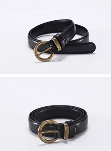 Details of women's black leather belt featuring antique brass round buckle for retro style.