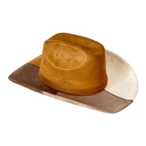 Close-up detail view of the vintage suede patchwork cowboy hat showcasing texture.