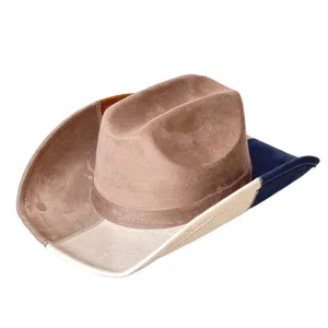Close-up detail of the vintage color-blocked suede cowboy hat showing fine stitching and texture.