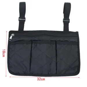 Wheelchair side storage bag detail view, black quilted fabric 32x18cm hanging pocket.