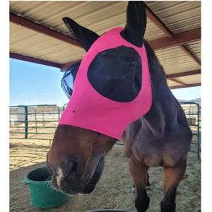 Detail shot of the pink and black horse fly mask showing breathable mesh design.