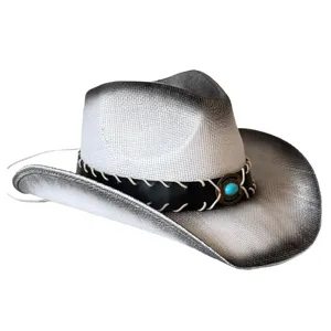 Western cowboy straw hat detail showcasing gradient weave, leather braided band and turquoise stone.