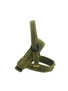 Detailed close-up view of the military green tactical dog harness with reflective webbing.