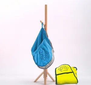 Chenille absorbent pet towel with cute paw print design for quick drying and easy care.