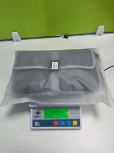 Portable waterproof baby diaper changing pad, foldable travel mat, grey weighing detail view.