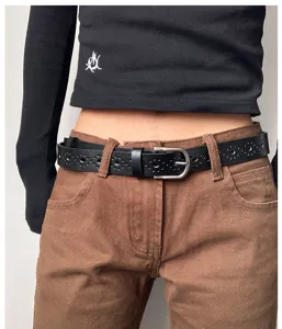 Black hollow leather belt for women, stylish pin buckle waist belt for jeans and casual wear.