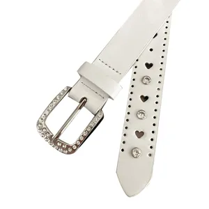Ceinture en cuir PU blanc avec boucle strass étincelante et découpes tendance femmes.