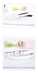 White skinny belt featuring metal flower buckle detail, perfect stylish women's accessory.