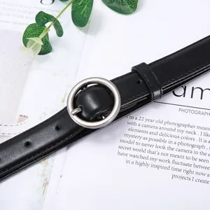 Classic black women's belt featuring a vintage round metal buckle, stylish casual accessory.