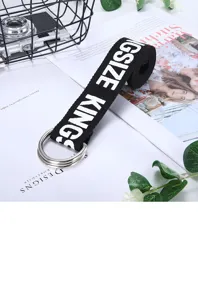 Black canvas belt featuring double silver metal rings and trendy letter print design.