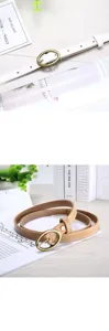 Women thin leather belt with gold oval pin buckle, elegant dress jeans belt for daily wear.