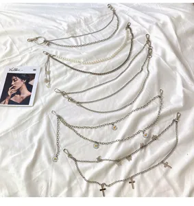 Versatile multi-style metal waist chains set featuring pearls butterflies daisies and cool hip-hop designs.