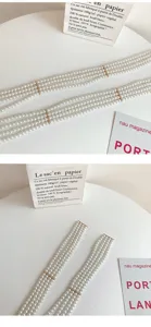Multi-strand pearl waist belt for women, elegant retro dress decorative chain with metal bars.