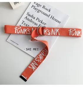 Orange canvas belt for men, stylish streetwear D-ring buckle belt with letter print details.