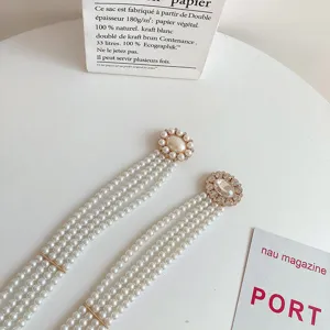 Elegant multi-strand pearl belt with rhinestone buckle for women dresses fashion accessories.