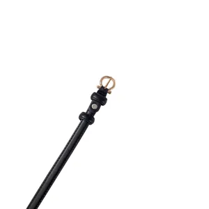 Black thin leather belt for women with elegant gold buckle, minimalist waist accessory.