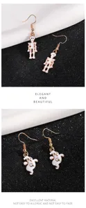 Halloween ghost and skeleton drop earrings detailed view, creative cute spooky holiday jewelry.