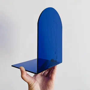 Blue acrylic arched bookend with minimalist human line art, desktop organizer detail view.