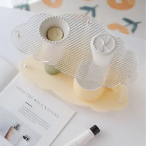 Acrylic cloud desktop storage rack, clear tiered organizer for cosmetics and perfume display.