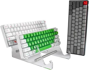Vista dettagliata del supporto per tastiera in acrilico trasparente per organizzazione desktop.