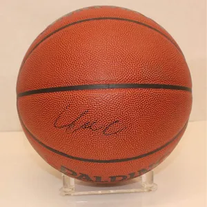 Clear acrylic display stand holder for basketball, football, and volleyball sports.