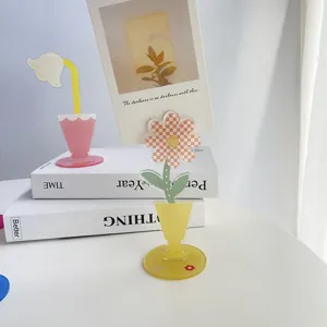 Acrylic flower photo clip detail showing cute desk memo holder and aesthetic room decor display.