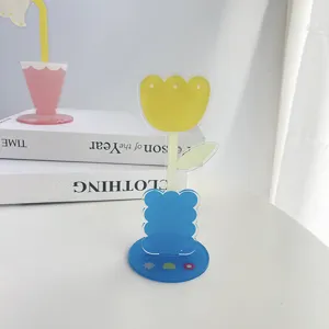 Acrylic flower memo holder detail view, cute desktop photo clip for office room decor.