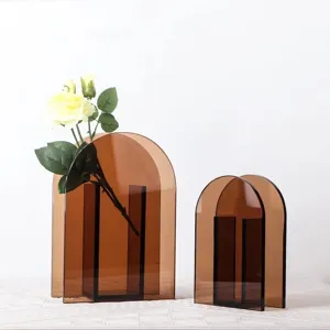 Modern minimalist brown acrylic arch vase set, clear geometric decorative home ornament.