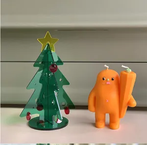 Sapin de Noël en acrylique et bougie de personnage mignon, idéal pour déco et cadeaux de fêtes.