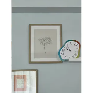 Reloj de pared creativo nórdico para salón, diseño fundido con números romanos, silencioso.