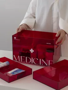 Transparent red acrylic medicine storage box with handle, home emergency first aid box organizer.