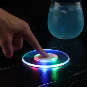 Close-up shot of the colorful LED glowing acrylic coaster with vibrant lights for bar parties.