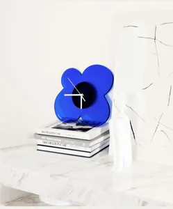 Modern minimalist acrylic blue flower wall clock detail scene, stylish home decor piece.