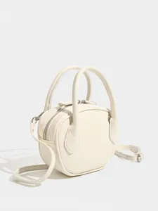 Minimalist white bowling bag top handle crossbody bag for women chic style daily use