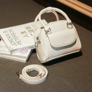 White top handle crossbody bag for women, versatile PU leather shell handbag with strap.