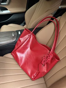 Red soft leather tote bag with stylish heart chain pendant, large capacity shoulder bag