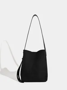 Schwarze Eimer-Umhängetasche für Damen, große Kapazität minimalistischer Retro-Stil.