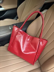 Red soft leather large capacity tote bag for women, stylish Korean style shoulder handbag.