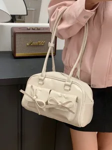 Schicke Bowling-Umhängetasche mit Schleife, elegante cremeweiße Handtasche für Alltag.