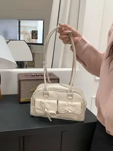 Schicke Schleife Bowling Umhängetasche für Damen, elegante Alltagstasche mit Vordertaschen.