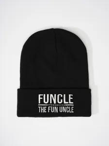Black knitted beanie detail showing white embroidered funcle text on brim for winter warmth.